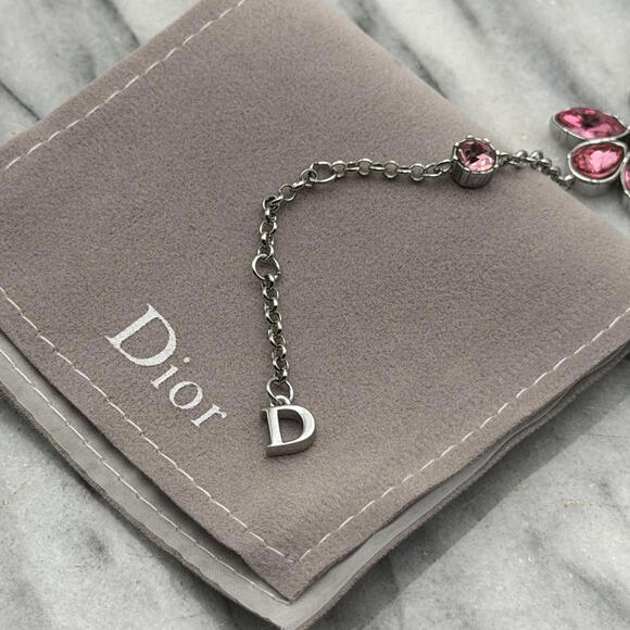 CHRISTIAN DIOR PINK CRYSTAL LOGO BUTTERFLY BRACELET - Picture 5 of 6